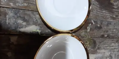 Saucers with liquid gold rims